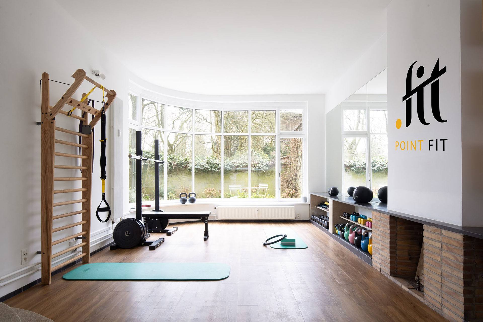 Studio privé PointFit à Uccle, baie vitrée sur jardin